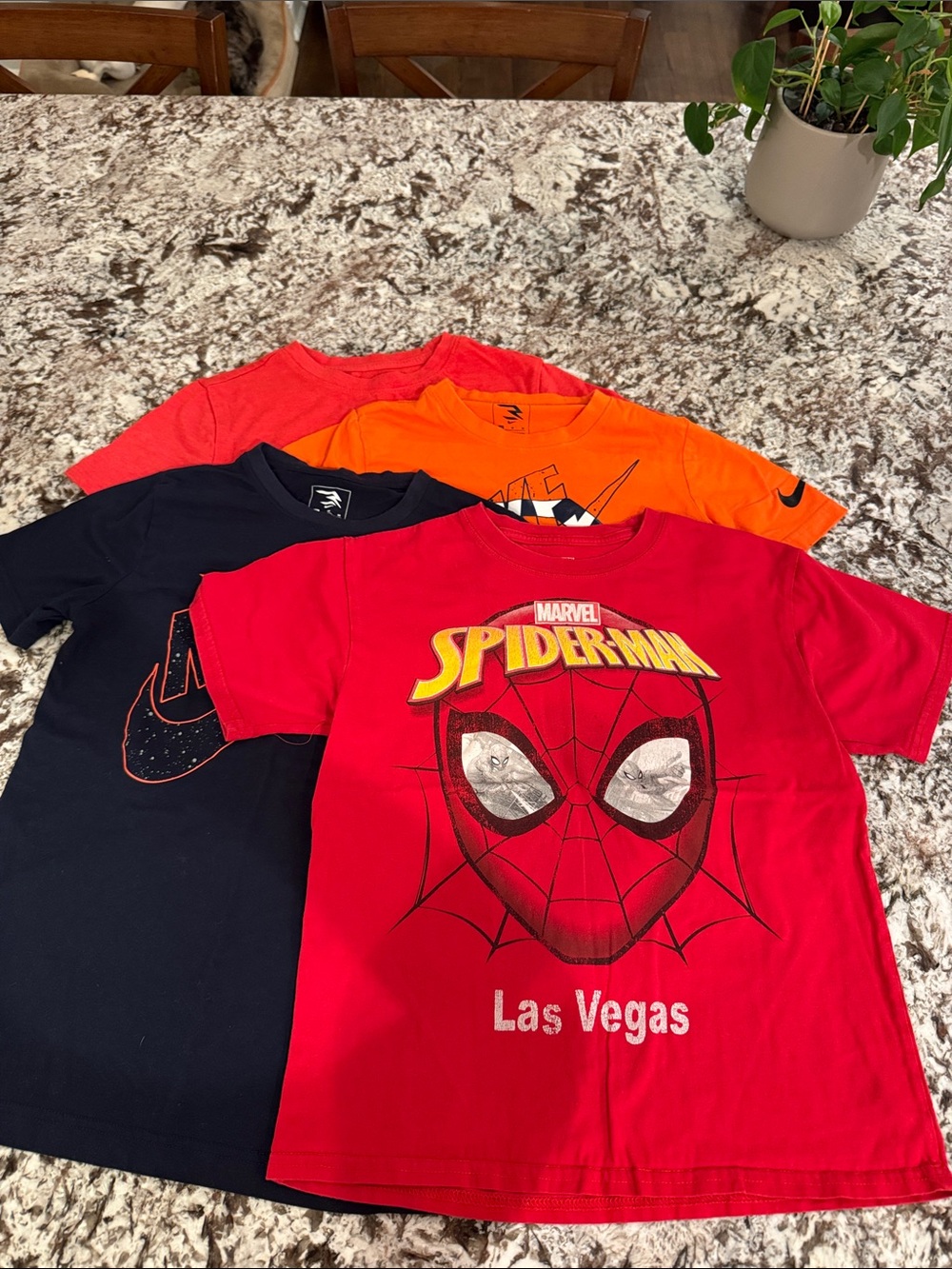 (4) T-shirts. 10/12 size. Nike, Marvel & Cat n Jack